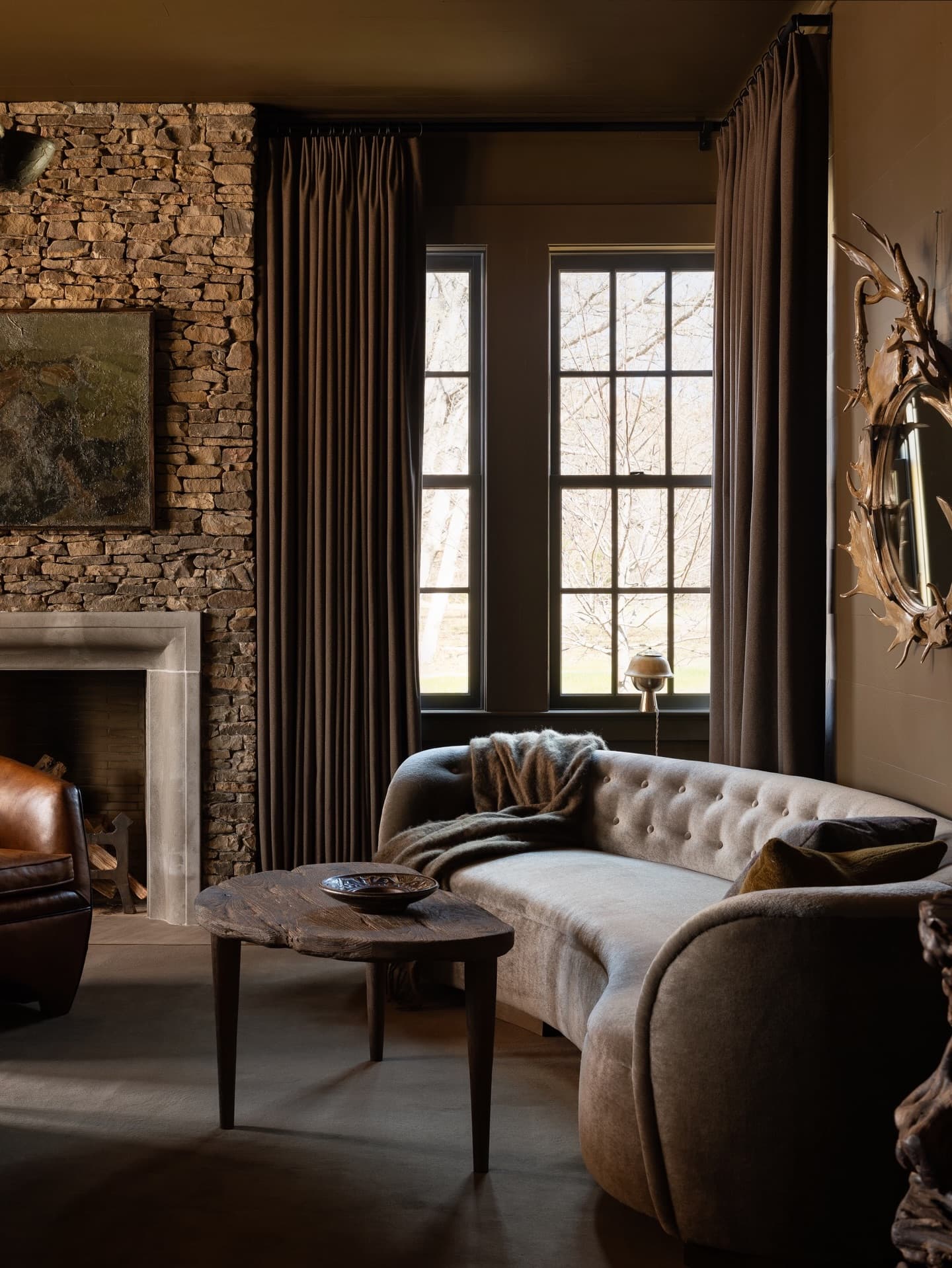 Living room with heavy curtains.