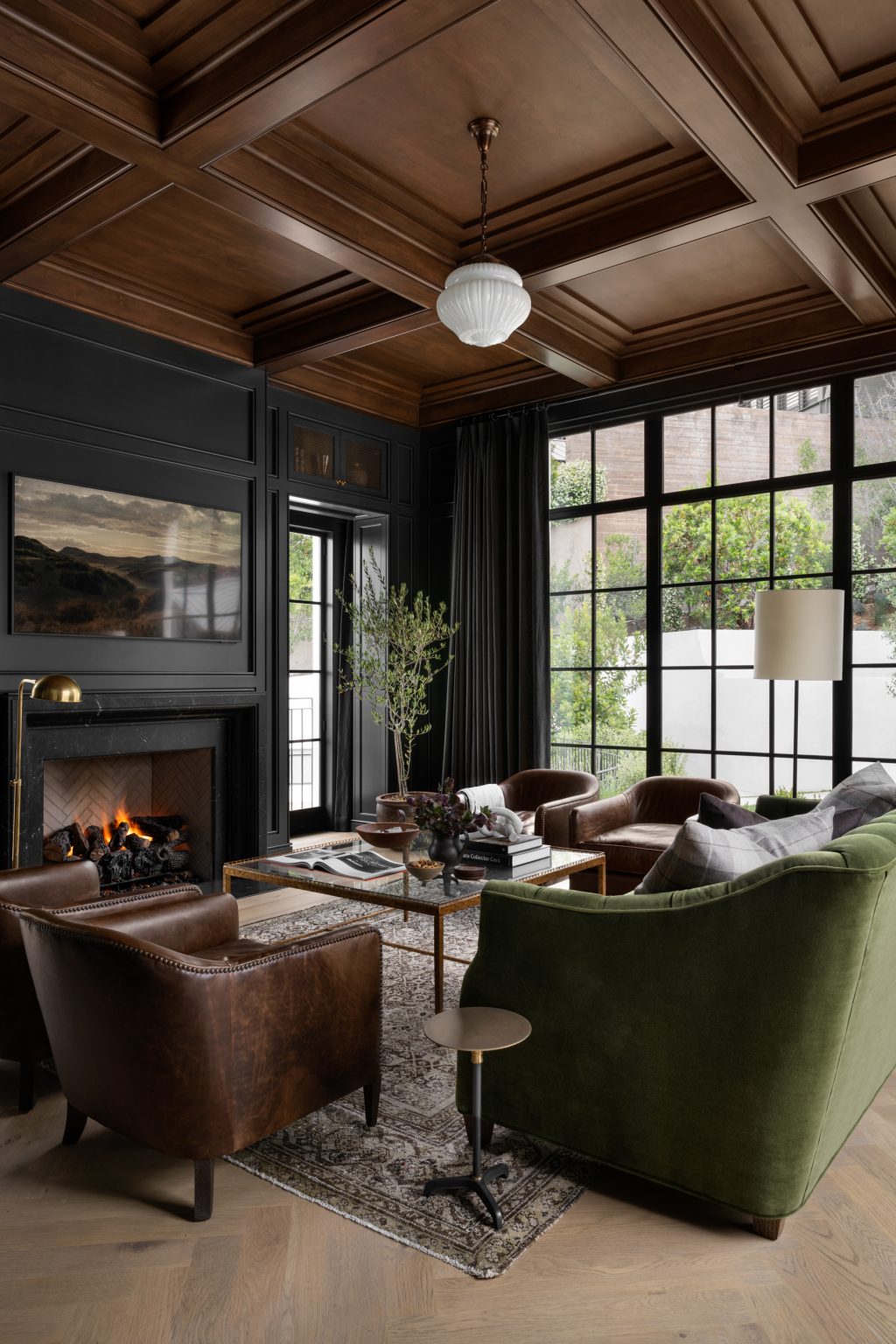 Moody living room with lighter ceiling.